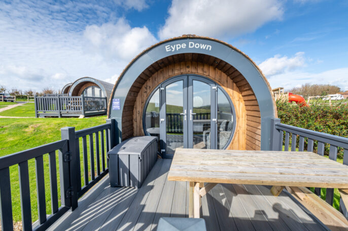 eype down premier camping pod decking and table glamping in dorset