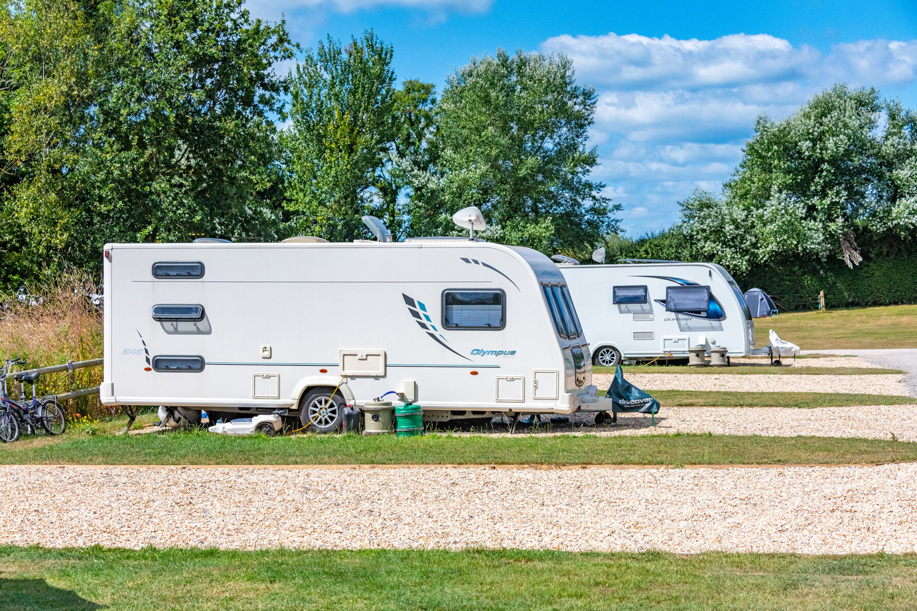 touring caravans on gravel pitch with electric